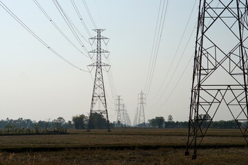 silhouette of high voltage transmission tower