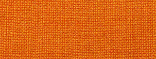 Wall Mural - Texture of dark orange color background from textile material with wicker pattern. Vintage ginger fabric