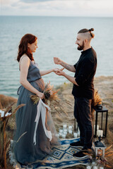 Wall Mural - wedding ceremony of a girl and a guy on high hills