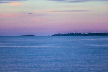 Wall Mural - Sunrise over bay of Cannes with Cap d'Antibes and Iles de Lerins, France