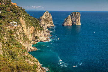 Wall Mural - Above Capri city cliffs and Faraglioni with boats and yacht, amalfi coast, Italy