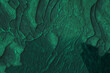 Artistic image of background surface plastering or malachite in dark green tones_
