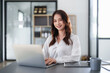 © itchaznong - Beautiful Business woman working at home office and analyze financial report document. Accounting and Finance concept