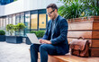 © bobex73 - Good news. Happy smiling businessman checking mail from his client on laptop. Business, lifestyle concept
