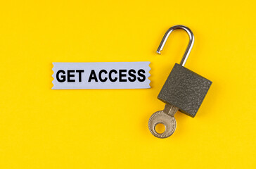Poster - On the yellow surface lies an open lock with a key, next to it is a sticker with the inscription - Get Access