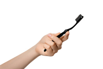 Woman's hand with a toothbrush. Isolate on a white background.