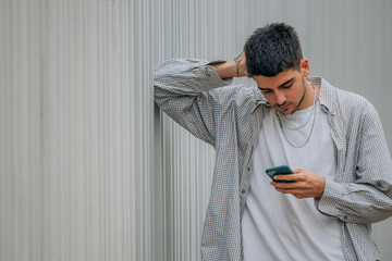 Sticker - teenager with mobile phone in the street