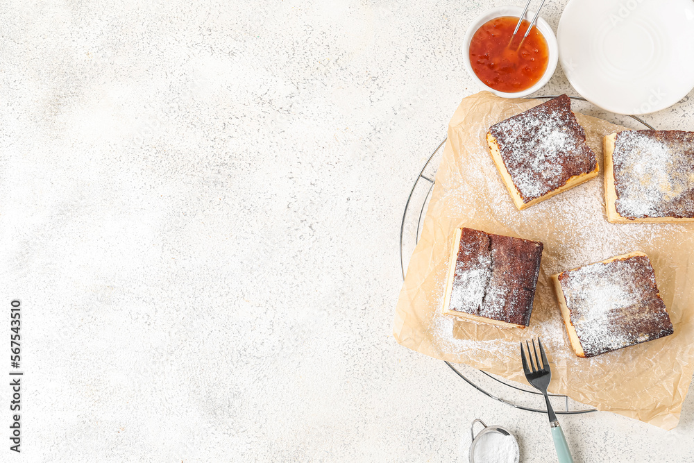 Grid with pieces of cottage cheese casserole and jam on light background