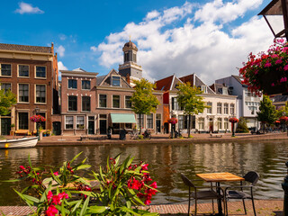 Wall Mural - Picturesque view of houses, streets and canals at Leiden town at summer day, Netherlands