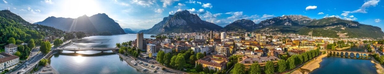 Wall Mural - Aerial view of Lecco city in the southeastern shore of Lake Como, in northern Italy.