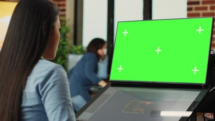 Poster - Asian woman using game developing software and greenscreen display on monitors. Artistic editor working with blank chroma key template on isolated copyspace, planning 3d project.