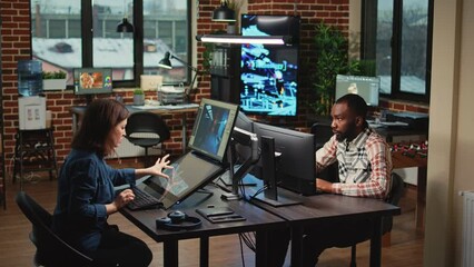 Poster - Diverse team of engineers working with artificial intelligence, analyzing 3d render software on computer. Man and woman brainstorming ideas to create artistic modern content at office.