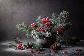 Wall Mural - Winter still life with snow-covered spruce branches and viburnum