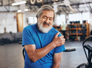 Wall Mural - Sports, gym and shoulder injury, old man in pain and emergency during workout at fitness studio. Health, wellness and inflammation, senior person with hand on muscle cramps while training in Japan.