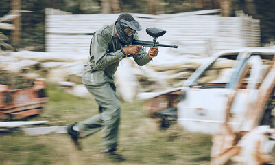 Canvas Print - Paintball, speed or man running in a shooting game playing with fast war action on a fun battlefield. Mission focus, military or guy with a gun or weapon gear for survival in an outdoor competition