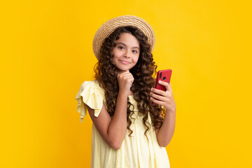 Poster - Teenage girl with smart phone. Portrait of teen child using mobile phone, cell web app. Happy teenager, positive and smiling emotions of teen girl.