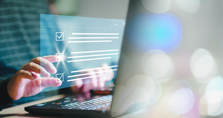 Poster - Checklist on Digital system. Digital work checklist on virtual screen concept, Businessman use a pen point on checklist and use laptop working in office Document Management. efficiently manage file.