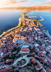 Poster - Aerial sunset view of Egirdir lake peninsula and town in Isparta region. Calm turquoise and scenic coast of national park in Turkey
