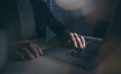 Businessman works on laptop. Hands and keyboard. Technology, business, working and writing concept.