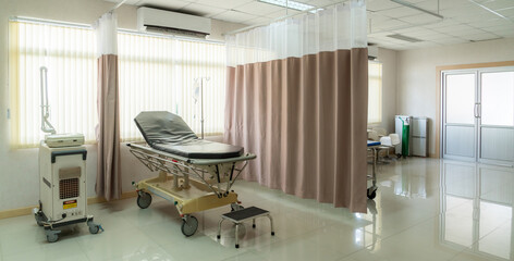 Wall Mural - Sterile recovery room equipped with comfortable modern medical sickbed for patient recovery. Photo of a hospital bedroom or ward for patient treatment for medical usage.