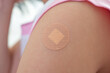 © Kwangmoozaa - Vaccinated little asian girl with adhesive plaster after vaccine injection