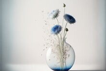  A Vase Filled With Blue Flowers On Top Of A Table Next To A White Wall And A White Wall Behind The Vase Is A Blue And White Wall.  Generative Ai