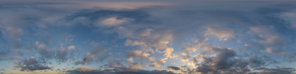 Dark blue sunset sky panorama with Cumulus clouds. Seamless hdr pano in spherical equirectangular format. Complete zenith for 3D visualization, game and sky replacement for aerial drone 360 panoramas.