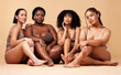 © Nina L/peopleimages.com - Body, diversity and portrait of natural women group together for inclusion, beauty and power. Aesthetic model people or friends on beige background with skin glow, pride and motivation for self love