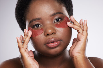 black woman, face and portrait with eye patch for skincare, healthy skin and glow isolated on studio