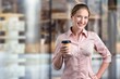 © BillionPhotos.com - Young smart business person with coffee cup on outdoors