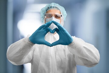 Wall Mural - Medical doctor hands in heart form.