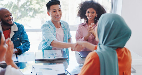 Canvas Print - Handshake, success or happy employees meeting kpi goals, bonus achievement or sales target in office. Muslim, black woman or black man shaking hands with Japanese worker clapping for a business deal