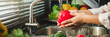 © joyfotoliakid - Hand of maid washing tomato fresh vegetables preparation healthy food in kitchen
