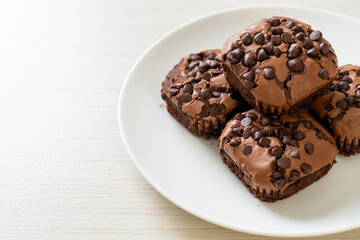 Wall Mural - dark chocolate brownies topped by chocolate chips