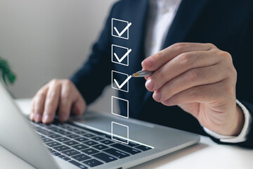 Businessman tick correct mark to approve document iso checklist icon.checkmark quality management quality assurance or QA and quality control or QC and improvement, Standardization and certification.