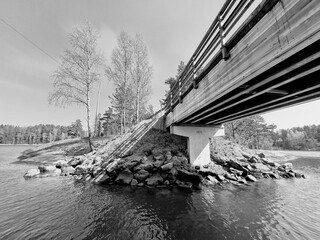 Black and white monochrome architecture details bridge over sea strait