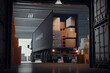 © VICHIZH - Truck for transportation stands in a warehouse with boxes and shelves, loading goods. Generative AI
