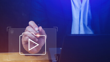 man pointing at virtual reality icon, watch videos via wireless technology, training, learning, teac