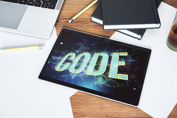 Aufkleber - Creative Code word sign on modern digital tablet display, international software development concept. Top view. 3D Rendering