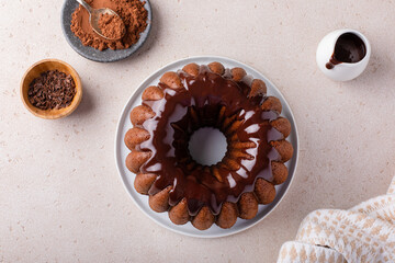 Wall Mural - Chocolate marble bundt cake with chocolate glaze drizzled on top