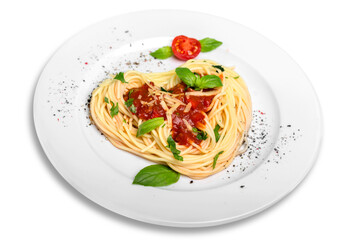 Wall Mural - Spaghetti pasta with tomatoes and basil on plate