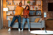 © Prostock-studio - Happy black lovers having fun at home, recording video