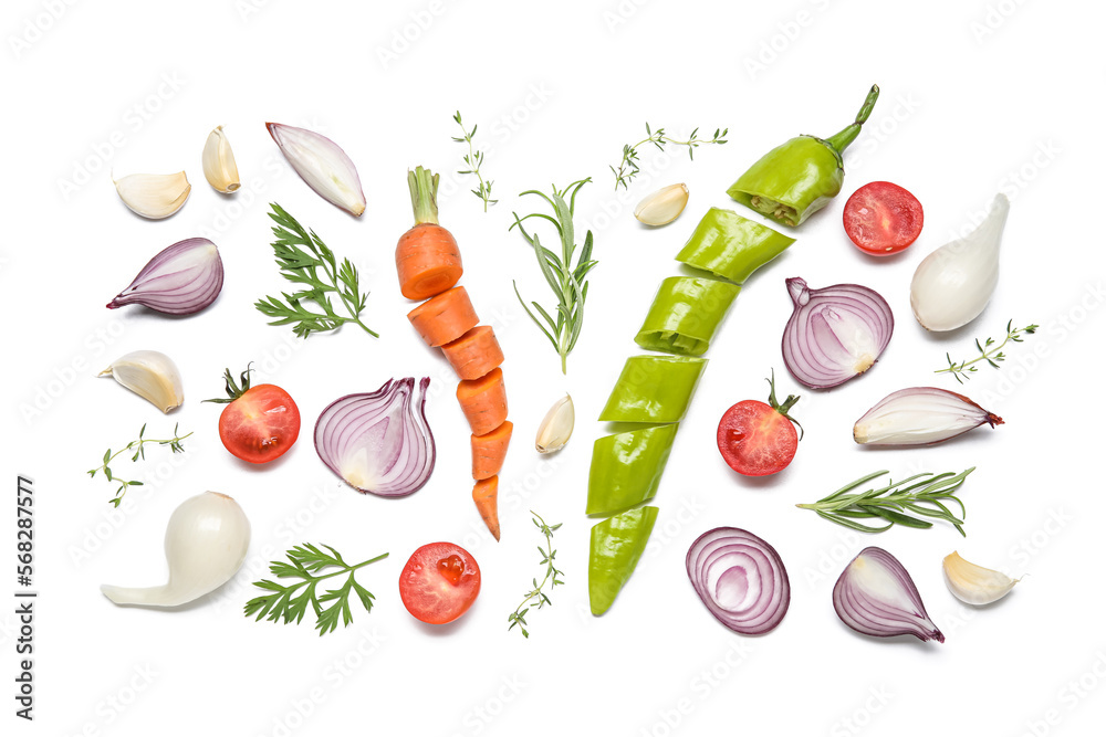 Composition with different vegetables and herbs isolated on white background