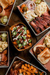 © Cavan Images - Tabletop Scene of Texas BBQ Trays