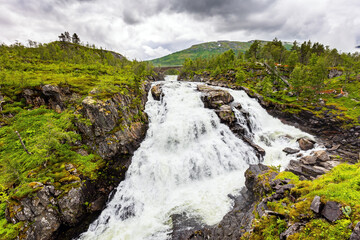 Sticker - The waterfall falls into gorge.