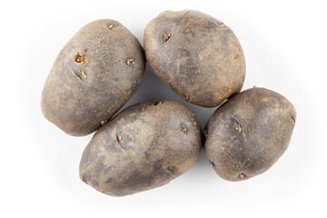 Poster - Vitelotte potatoes. Raw unpeeled purple potatoes isolated on white background, full depth of field.