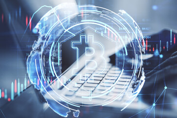 Aufkleber - Close up of businessman hands using laptop with glowing bitcoin hologram on blurry background. Cryptocurrency and crypto market concept. Double exposure.