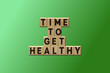 Grüner Hintergrund mit der Aussage Time to get Healthy
