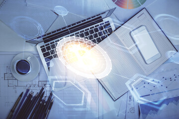 Poster - Blockchain theme hologram drawings over computer on the desktop background. Top view. Multi exposure. Concept of cryptoeconomy.