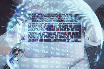Fototapete - Business theme hologram drawings over computer on the desktop background. Top view. Multi exposure. Concept of international connections.